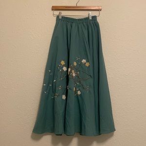 midi a line skirt with floral embroidery